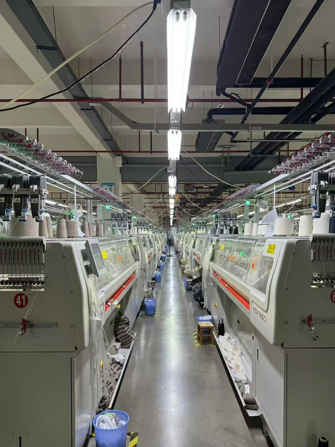 Cooperative production units for managed knitwear manufacturing capacity